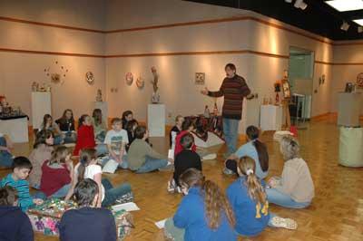 Bob Henry Baber poetry reading at a school